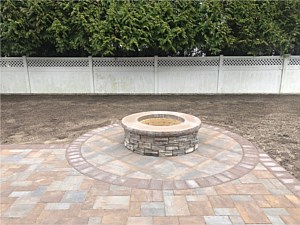 custom round cultured stone fire pit area patio